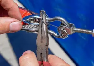 Twist the ends together to tighten the loop