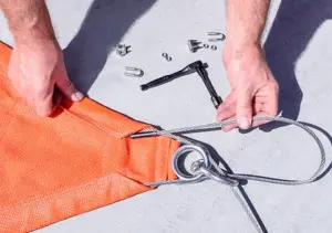 Feed one end of the Cable into the pocket