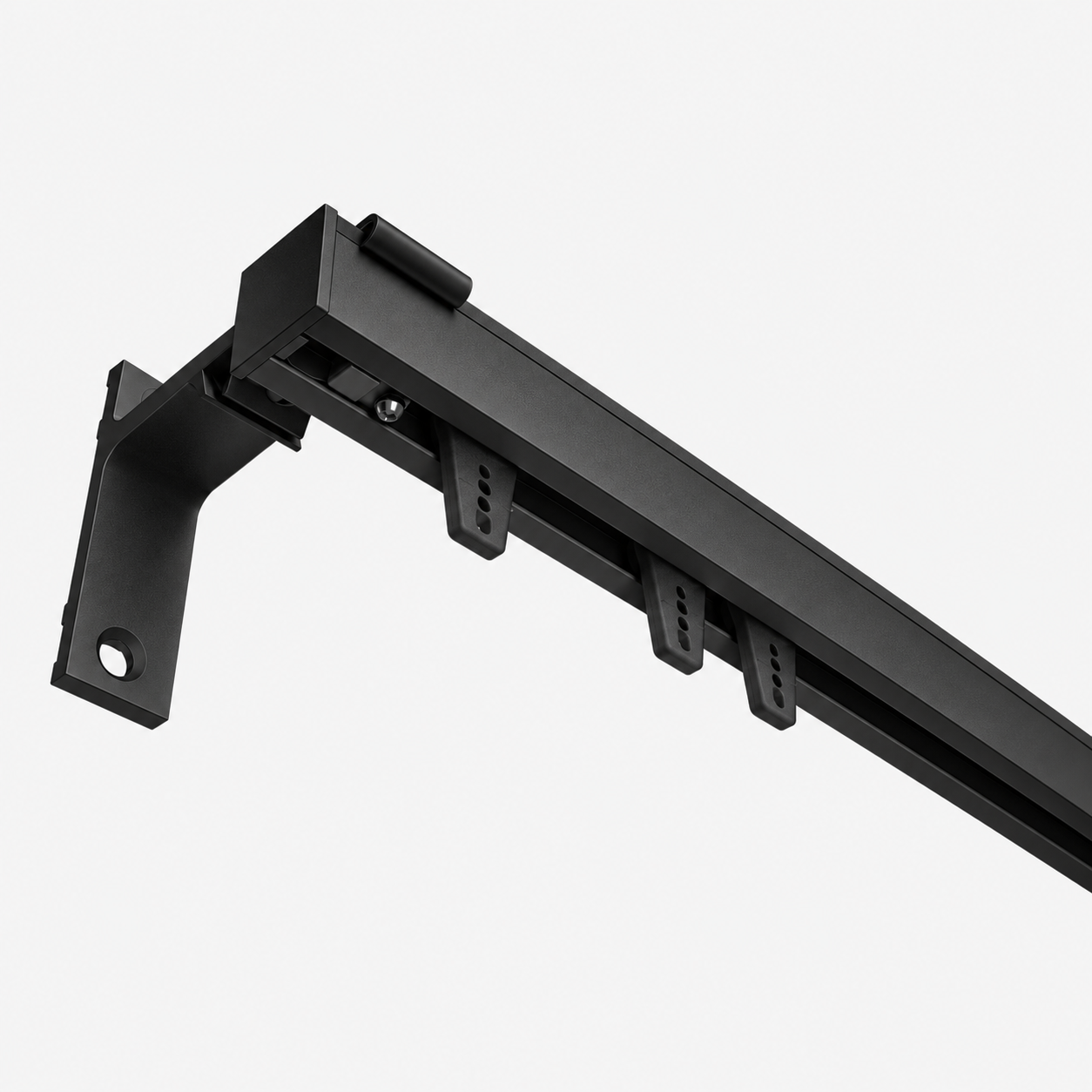 Black CS Contract Drapery Track with matching black carriers and wall-mount bracket