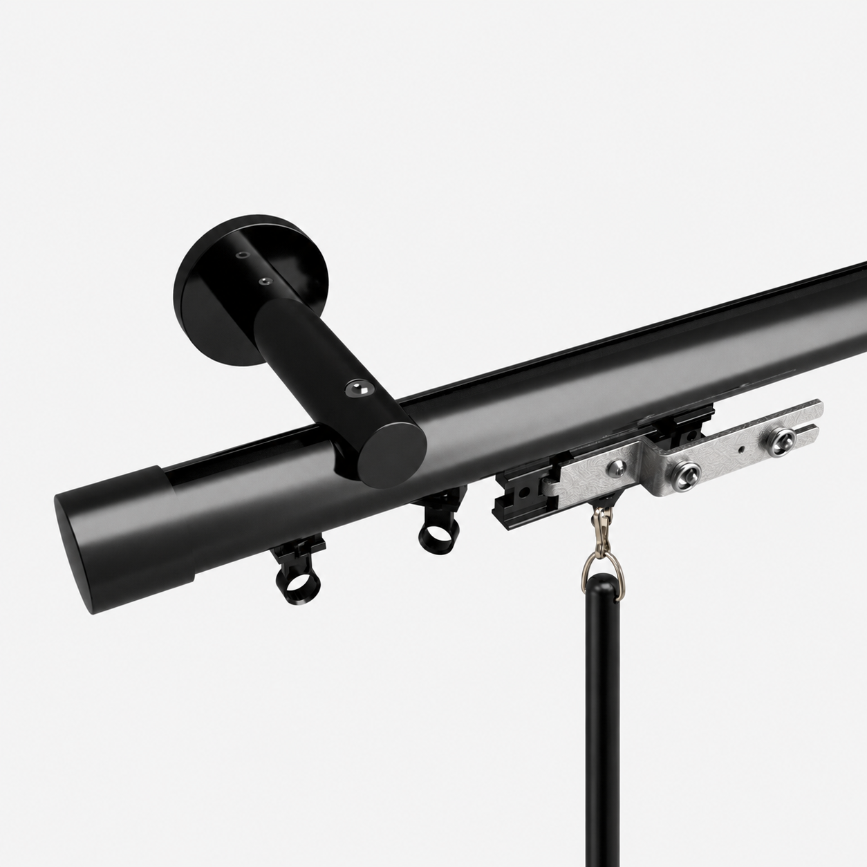 Black Traverse Rod with baton hanging below the master carrier