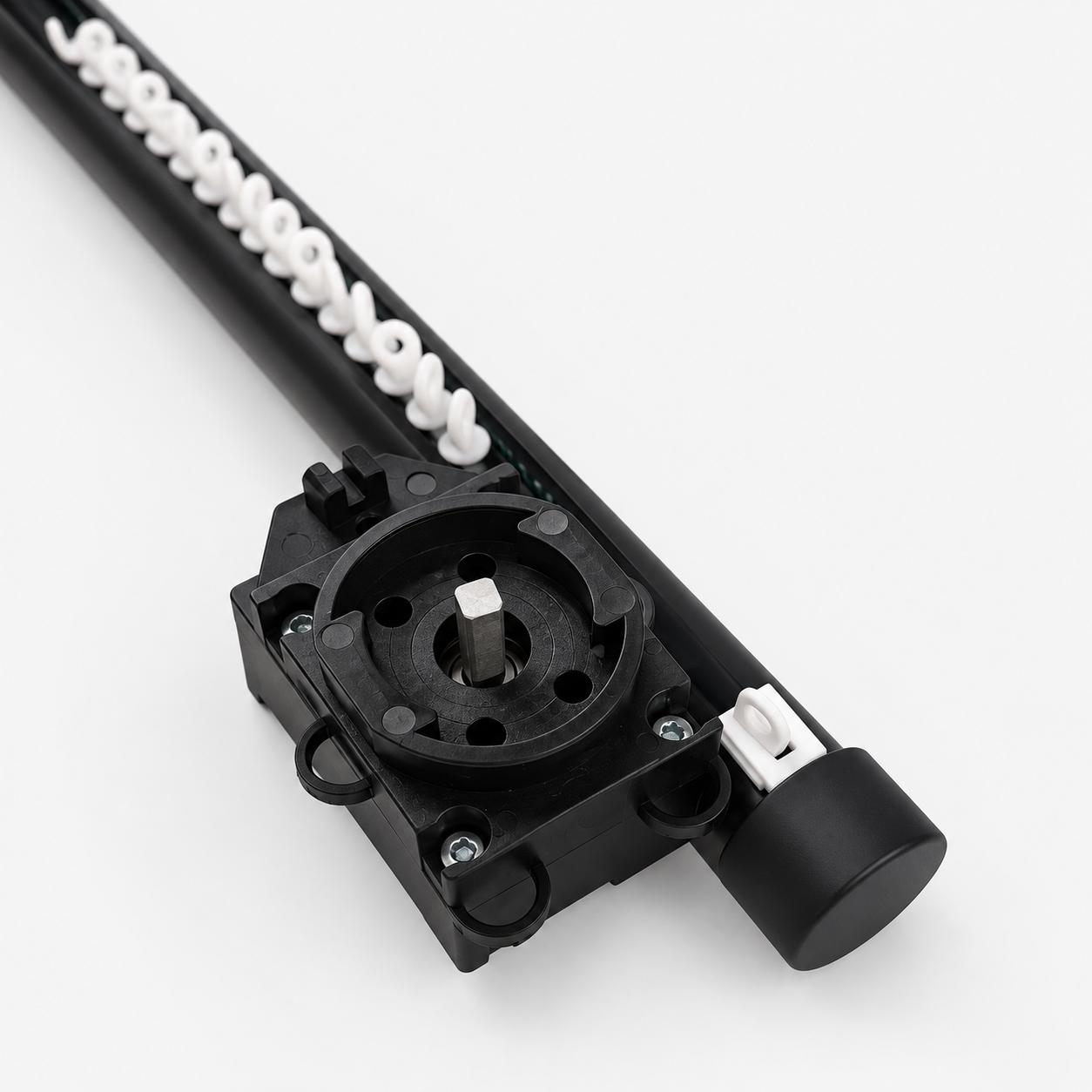 Black track showing the Lutron motor adapter and square drive shaft
